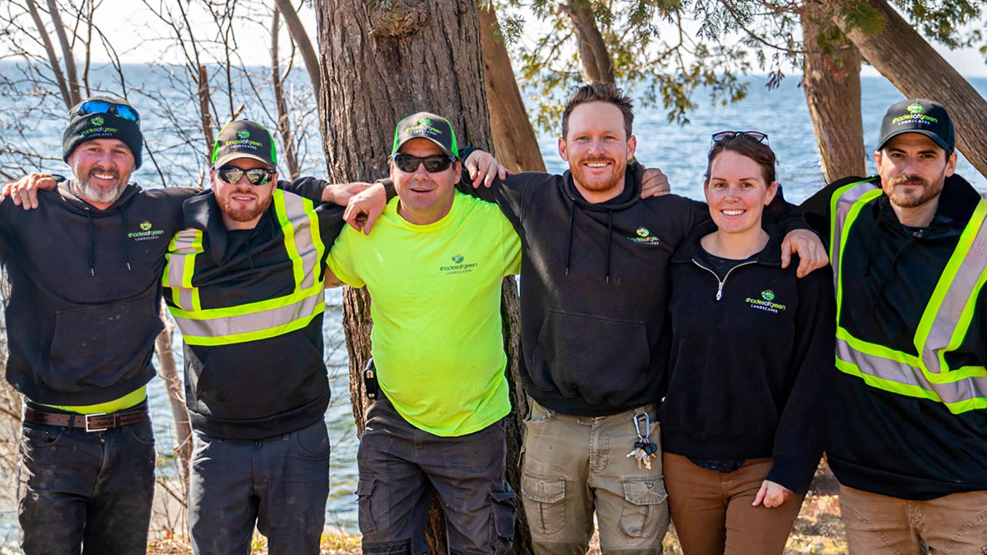 Shades of Green Landscapes - Custom home with lake view showcasing landscape design